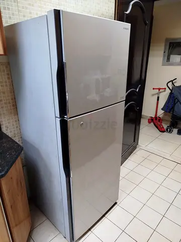 Silver top-freezer refrigerator - good working condition