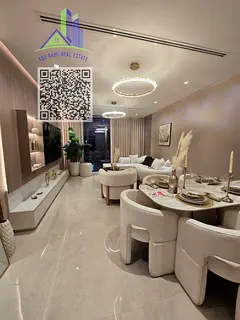 For sale in Al Aliah Ajman: Fully furnished apartments & studios with crystal lagoon views. 1% month