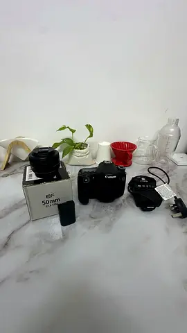Canon DSLR body with EF 50mm lens (kit) - good working condition