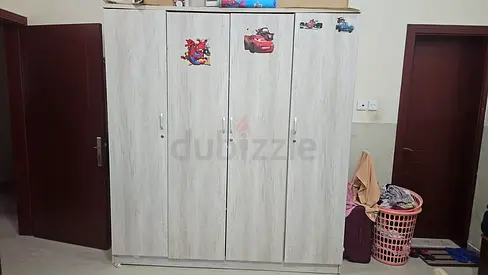 Price is negotiable. Wooden 4-Door Wardrobes/Armoire - Good Condition