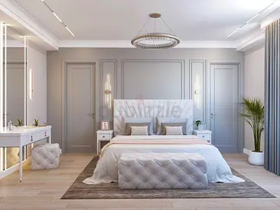 Modern upholstered king-size bed with nightstands and bench