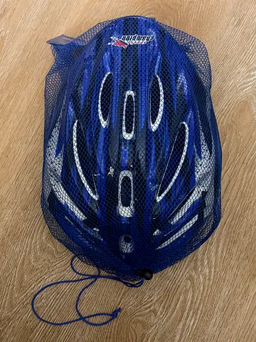 Cycle helmet with knee pads