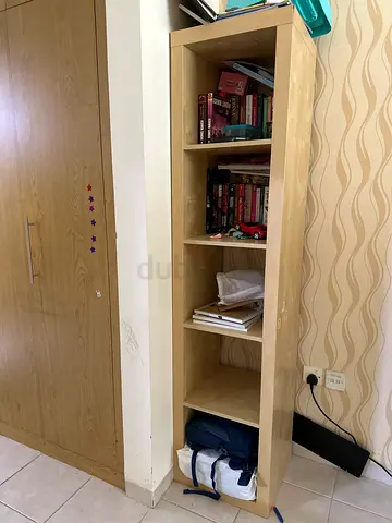 Light wood low bookcase with 4 compartments - good condition