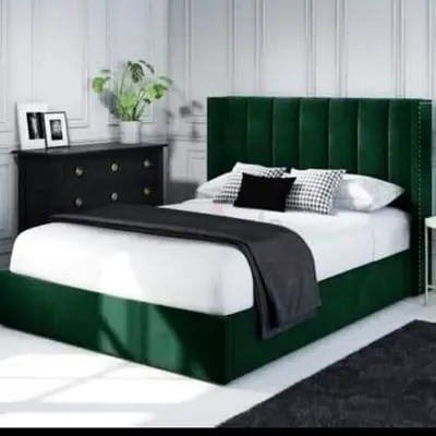 Queen green velvet upholstered bed with tall channel-tufted headboard