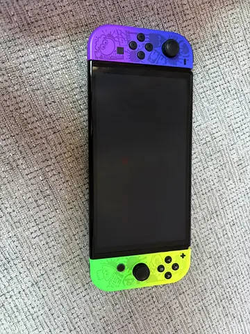 Nintendo Switch Oled Splatoon edition with the dock ( Only sold as a set)