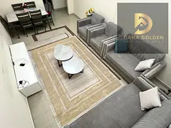 For monthly rent: two rooms, two living areas, and three bathrooms in Al Taawun, Sharjah.