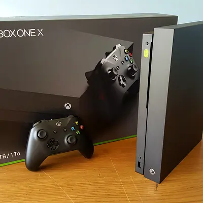 Xbox One X console + 2 controllers + Xbox camera system