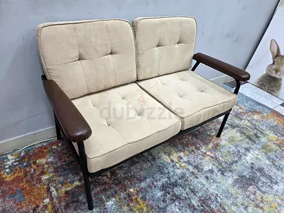 Compact 2-Seater Sofa with Beige Cushions and Wooden Arms