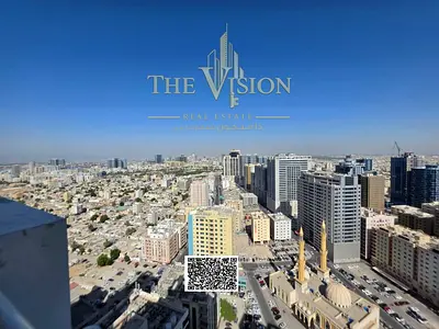 Two-bedroom apartment with a living room and city view, including parking and a closed kitchen.
