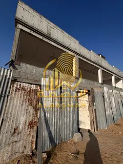 For sale: A property under construction, 85% complete, in a prime location in Al Sajaa, on a 97-mete