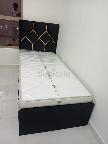Single upholstered bed frame with headboard and mattress - black