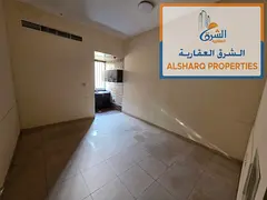 Ground-Floor Studio with Separate Kitchen, Spacious Layout & Central AC in a Prime Location Near Al 