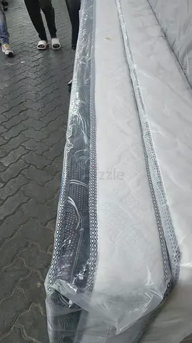 Queen-size mattress - brand new, still wrapped