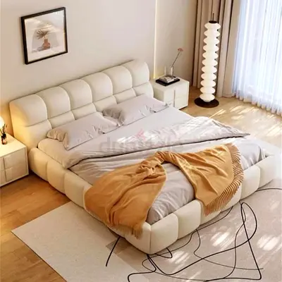 Low-profile modern upholstered queen bed with padded headboard (cream)
