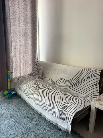 Light blue textured area rug - good condition