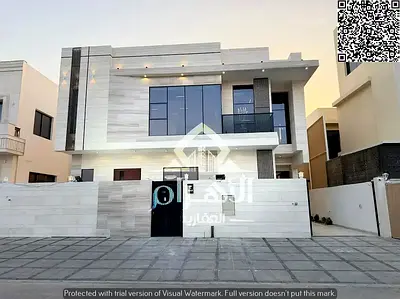 A luxurious 5-bedroom villa spread over two floors and a rooftop, located in a prime location close