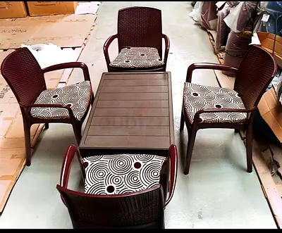 4 chairs with 1 table brand new