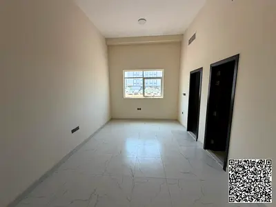 Brand-new studio for rent in Al Jurf 3, available for the first tenant. The studio features a spacious layout, a separate kitchen, central air conditi