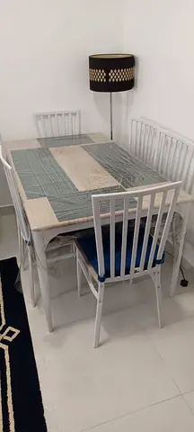 Home box dining table set with six chairs with ikea cushions hardly 6 months used 650 aed