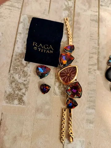 Titan Raga women's watch with matching multicolor crystal charms and spare crystals
