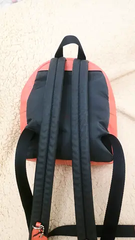 original coach mini bag Small coral and black backpack - good condition