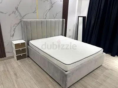 Grey upholstered double bed with mattress - modern velvet frame
