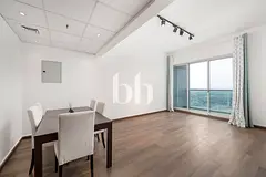 Spacious 1BR | High floor | Semi-furnished