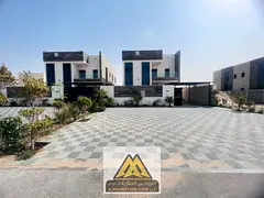 5 bedrooms, a living room, a majlis, and a private pool; high-end finishing. The villa boasts a prim