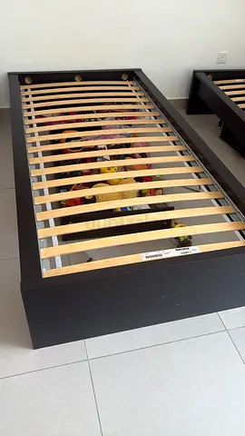 Single wooden slatted bed frame in good condition - dark finish