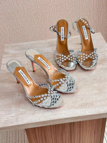 Silver crystal-embellished high heel sandals, size not specified