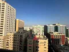 Two-bedroom apartment with a living room, open view, balcony, spacious area, free parking, and a pri