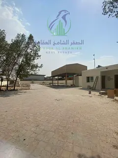 20000 Sq Ft Yard for Rent in Al Sajaa with Interlock Flooring Covered Shed 32 Power and Asphalt Road
