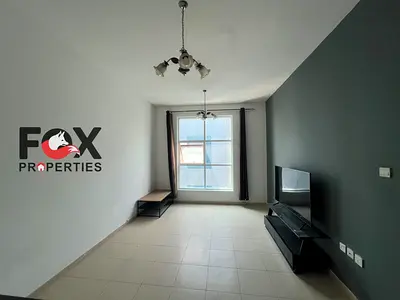 One-bedroom apartment with a living room for annual rent in Ajman, Al Nuaimiya 3 Price: 29,000 Features include 2 bathrooms, a balcony, and parking.
