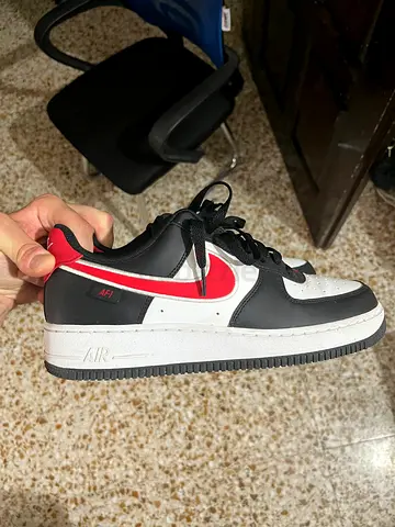 Used Nike Air Force 1 sneaker - black, white & red (single shown)