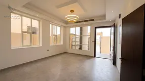 Second tenant 5 master bedrooms Majlis living room maid room covered parking roof central AC