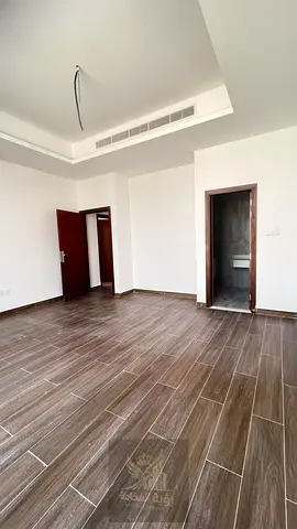 For rent in Al Jazzat, brand new two-story villa with 5 master bedrooms, spacious layout and prime location, 4 payments only