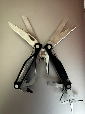Leatherman Charge AL Multitool - Pliers, Knife, Saw, Scissors, Bottle Opener (Brand New)