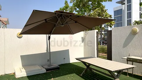 Large Cantilever Patio Umbrella and Outdoor Dining Table