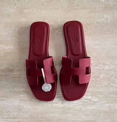 Maroon women's slide sandals — size not specified, gently used