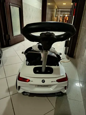 Kids BMW Z4 Roadster Ride-On Car with Steering Wheel — White for Kids