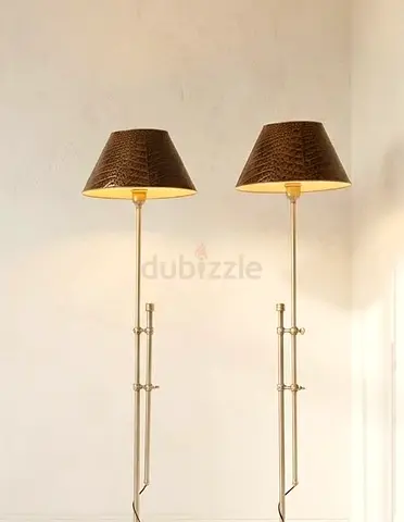 Pair of elegant adjustable steel  floor lamps with brown textured shades