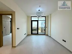 2BR Apartment | Remac Residence 12 | Balcony & Street View