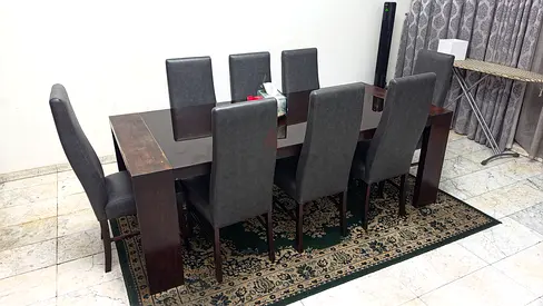 Solid Wood 8-Seater Dining Table with Glass Top and Upholstered Chairs