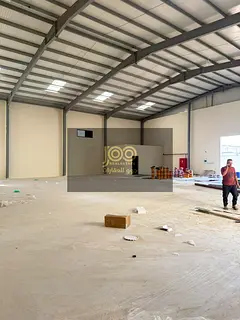 A spacious warehouse and yard is available for annual rent in Al Thoob, Umm Al Quwain, offering a to