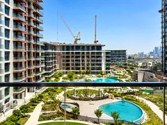 Courtyard & Pool View | 2BR Apartment | Modern Equipped Kitchen