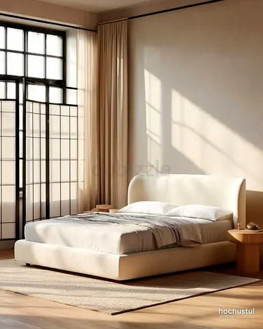 Modern upholstered king-size bed with padded headboard