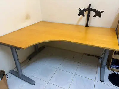 L shaped study desk along with chair