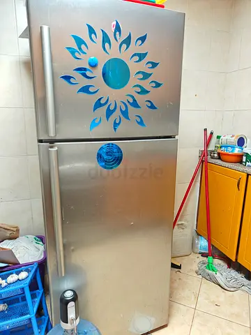 Silver double-door Hoover 520ltr refrigerator . in working condition