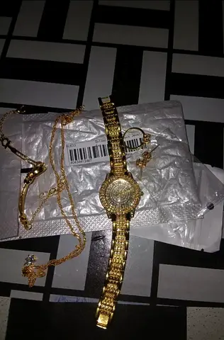 Gold-tone women's watch with matching gold necklace and rings - new set