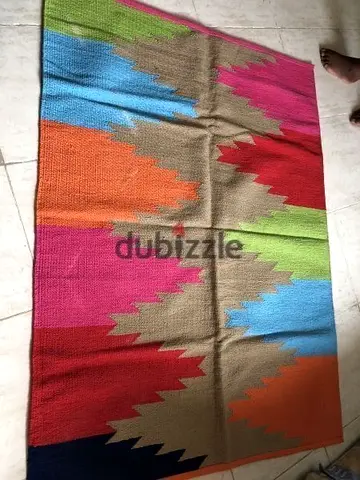 Colorful geometric flatwoven rug - good used condition